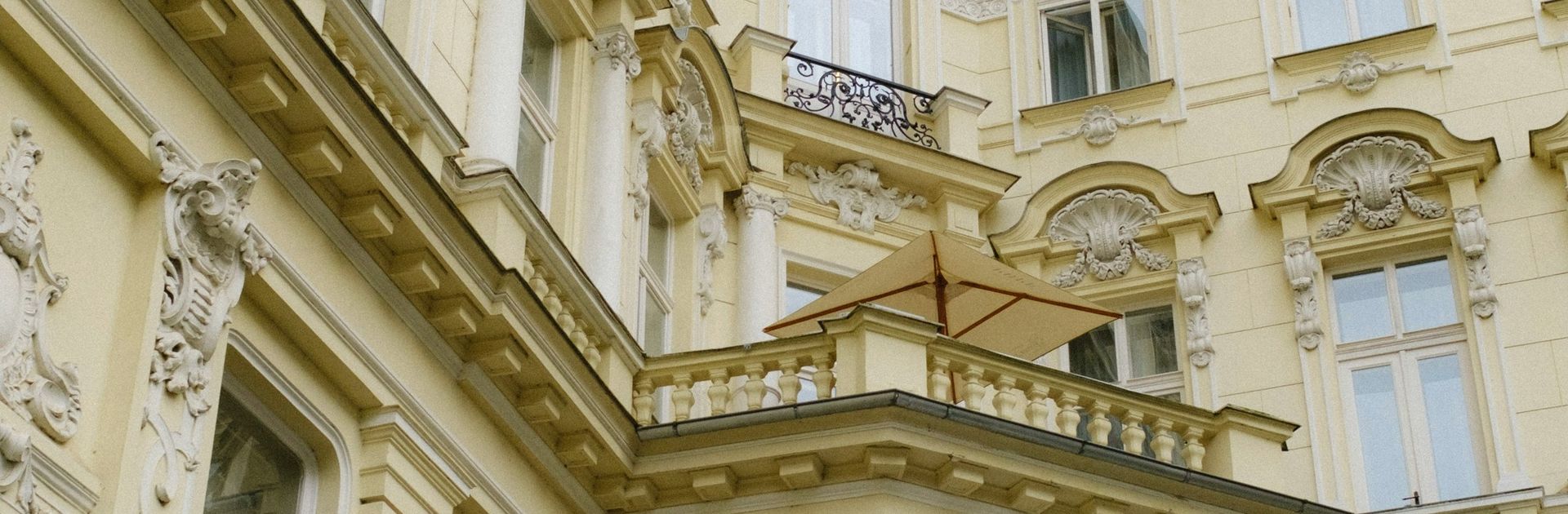 The facade of a grand European hotel