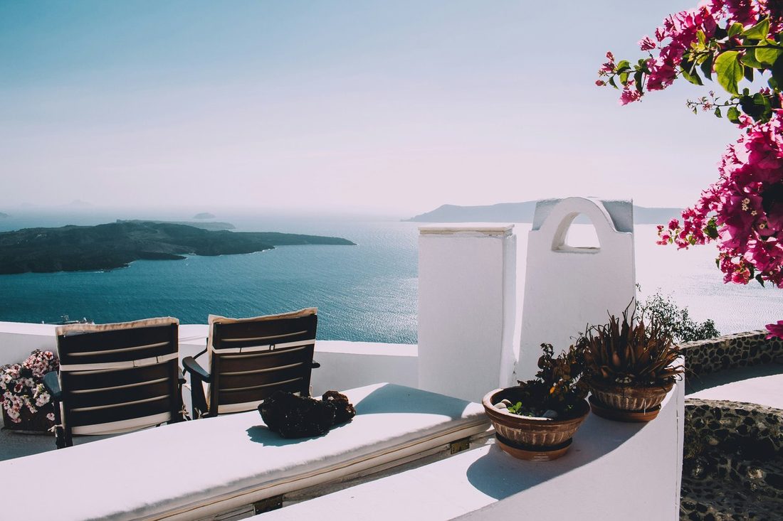 A whitewashed terrace above the sea