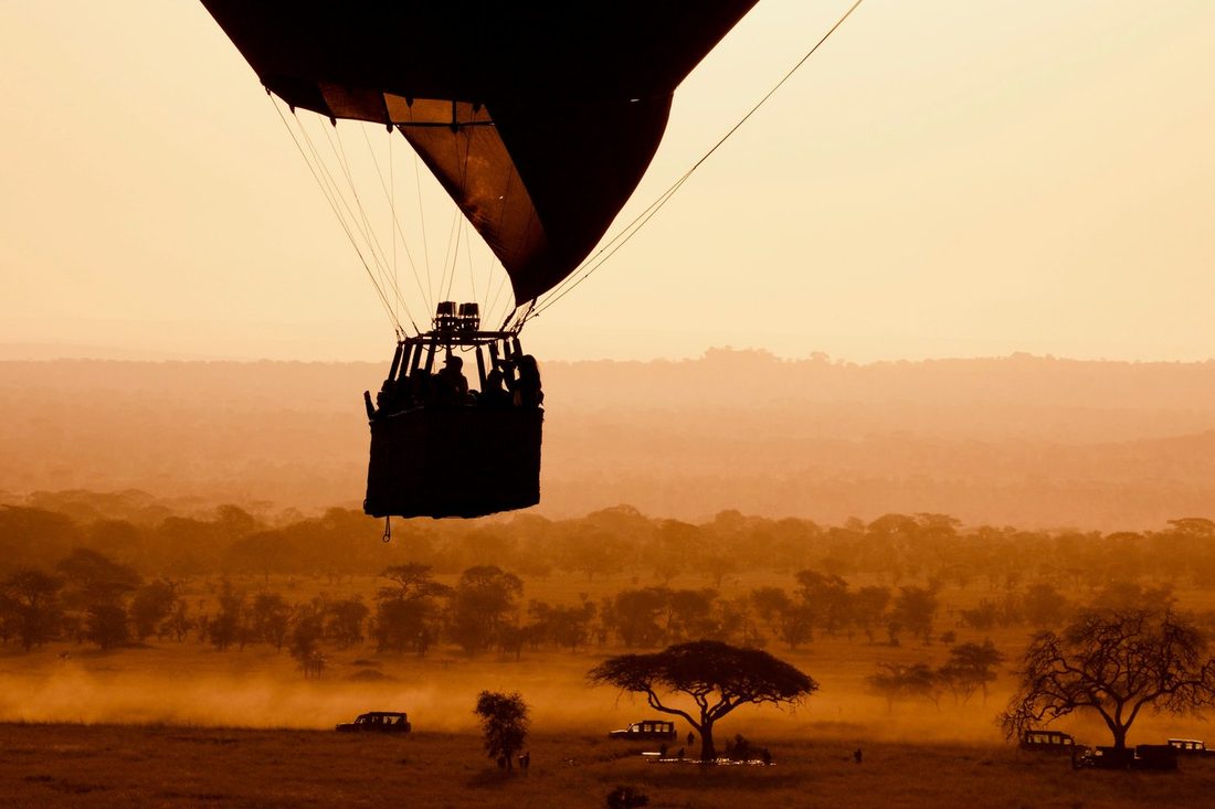 A balloon over the savannah at first light
